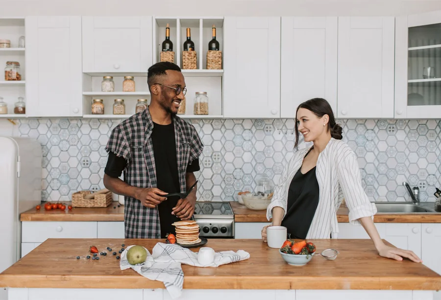 A couple cooking in their kitchen